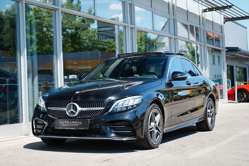 Schwarz Gebraucht 2020 Mercedes C300e AMG line Limousine | 30.990 € (Teuer) - Bild 1/4