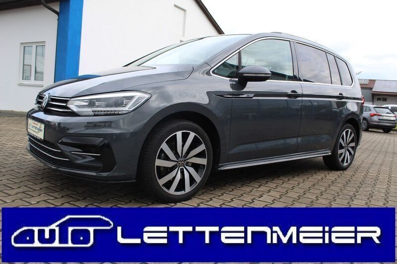 Grau Gebraucht 2024 VW Touran Highline Van / Kleinbus | 38.690 € (Etwas zu teuer) - Bild 1/4