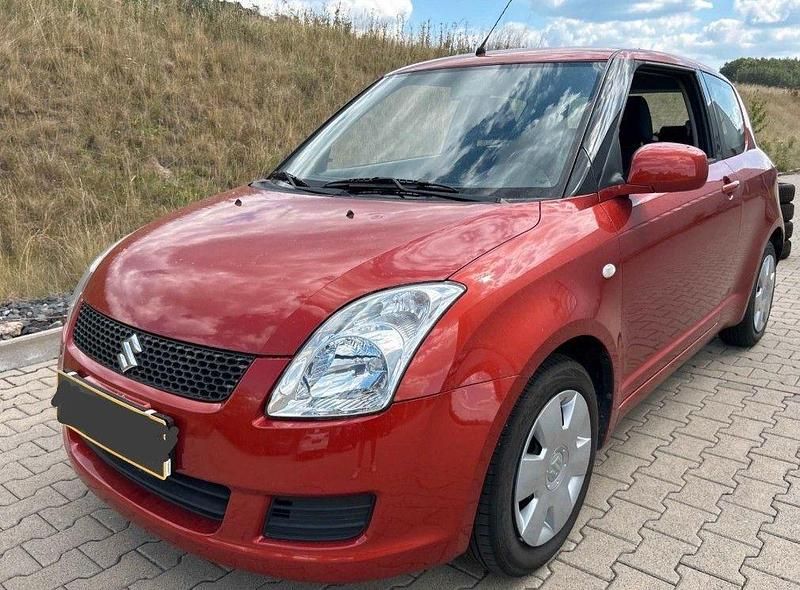 Orange Gebraucht 2009 Suzuki Swift Club Limousine | 3.499 € (Fairer Preis) - Bild 1/4