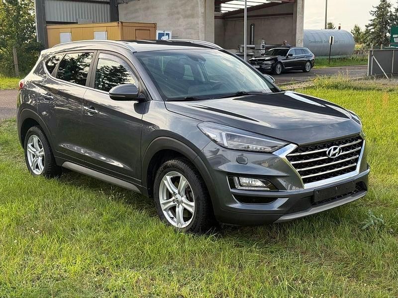 Grau Gebraucht 2019 Hyundai Tucson Premium SUV | 17.990 € (Guter Preis) - Bild 1/4