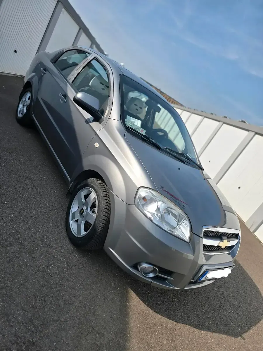 Second-hand Chevrolet Aveo 95 CP (69 kW) 2009 Argintiu Berlinǎ