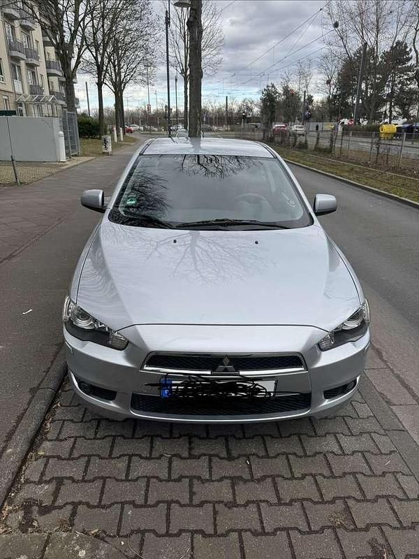 Silber Gebraucht 2011 Mitsubishi Lancer Inform Limousine | 6.600 € (Teuer) - Bild 1/4