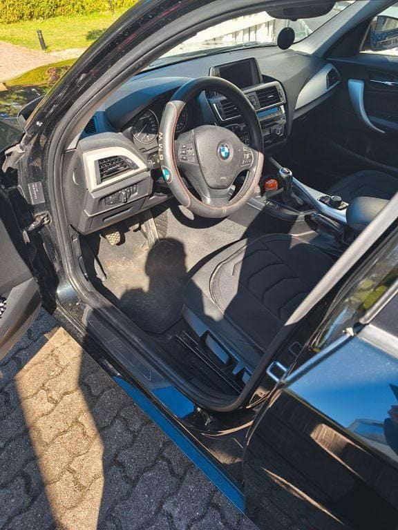 Second-hand BMW 116 109 CP (80 kW) 2017 Negru Hatchback