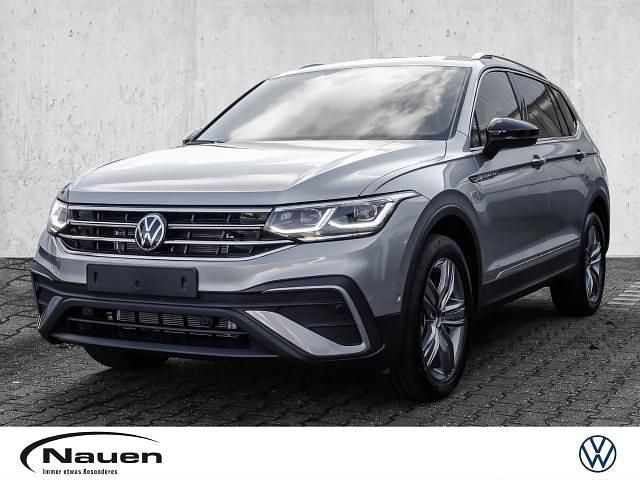 Pyritsilber Gebraucht 2024 VW Tiguan Allspace Move SUV | 39.969 € (Fairer Preis) - Bild 1/3