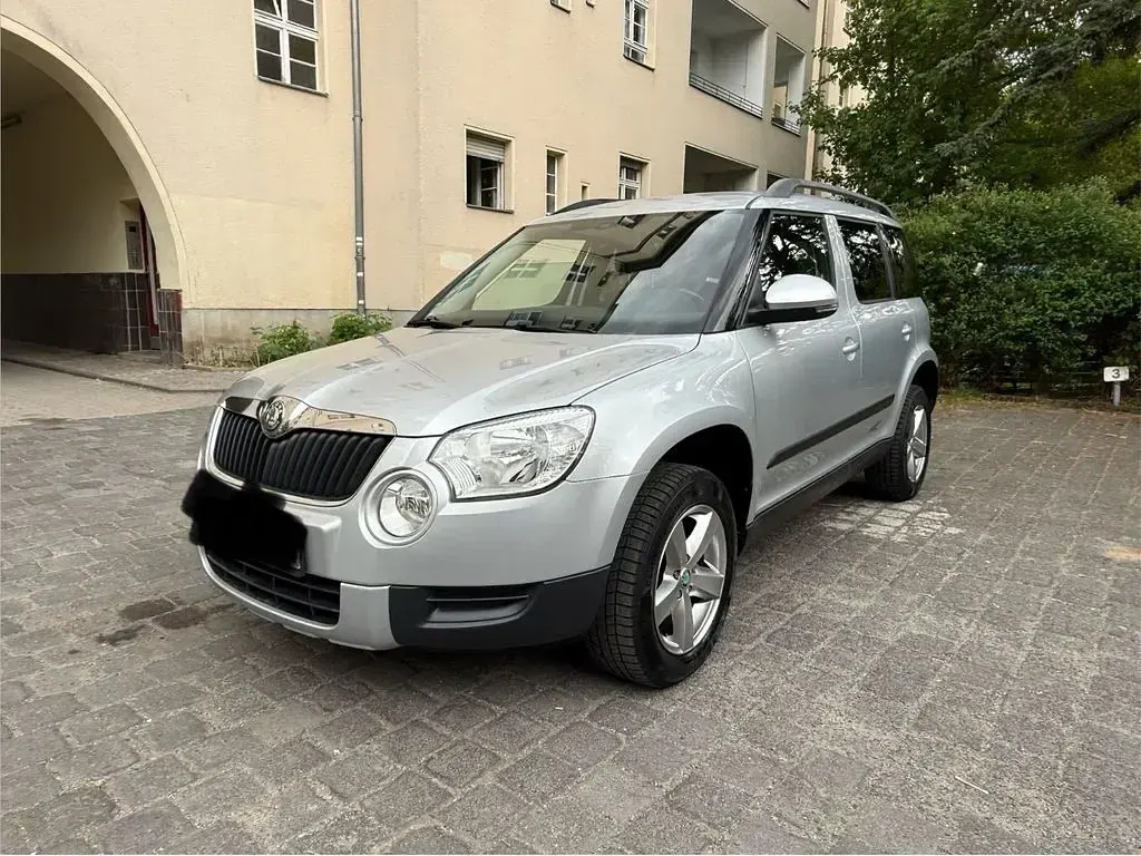 Używany Skoda Yeti Ambition 110 KM (80 kW) 2013 Srebrny SUV