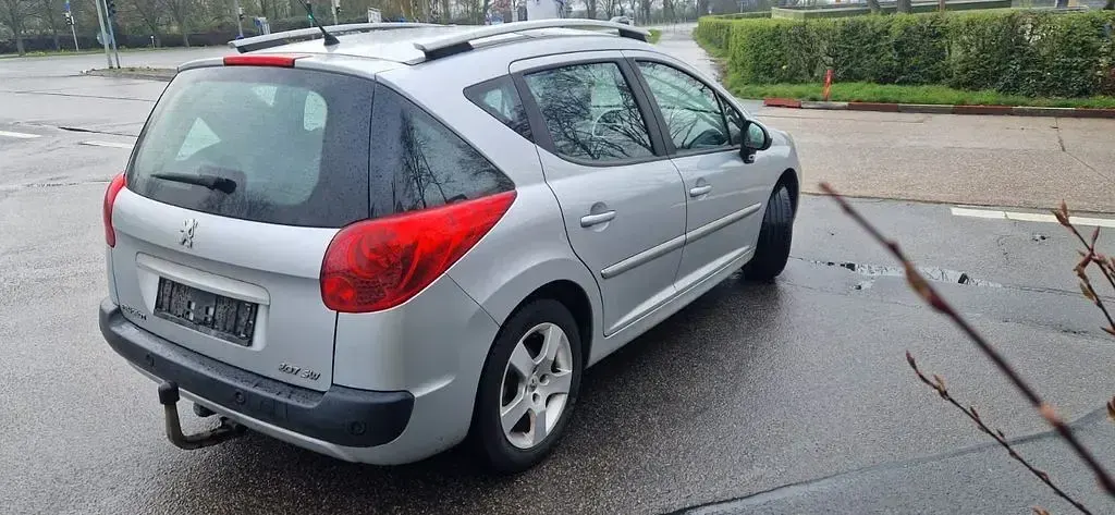Gebraucht Peugeot 207 Premium 120 PS (88 kW) 2011 Silber Kombi
