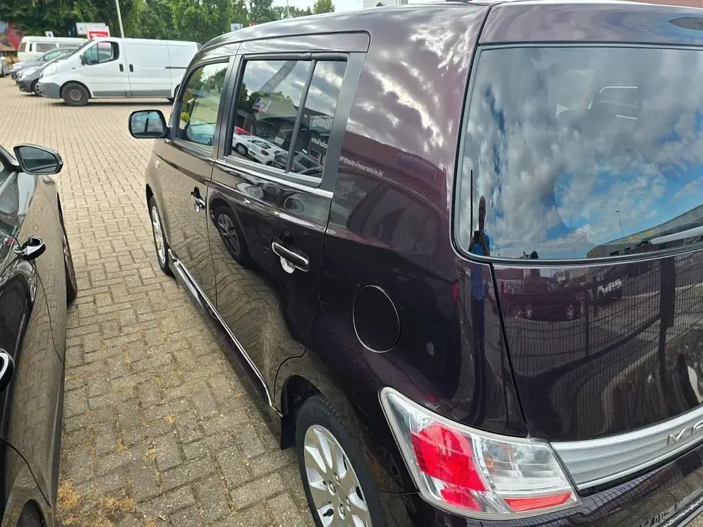 Gebraucht Daihatsu Materia 103 PS (75 kW) 2010 Rot Van / Kleinbus