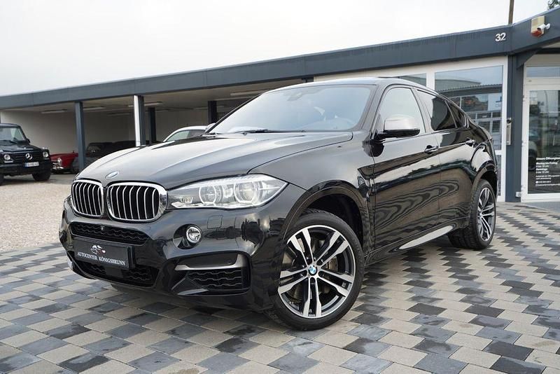 Schwarz Gebraucht 2018 BMW X6 M50 Comfort Edition SUV | 41.950 € (Fairer Preis) - Bild 1/4