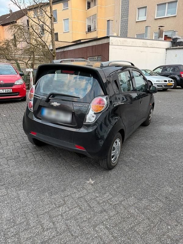 Second-hand Chevrolet Spark 82 CP (60 kW) 2011 Negru Hatchback