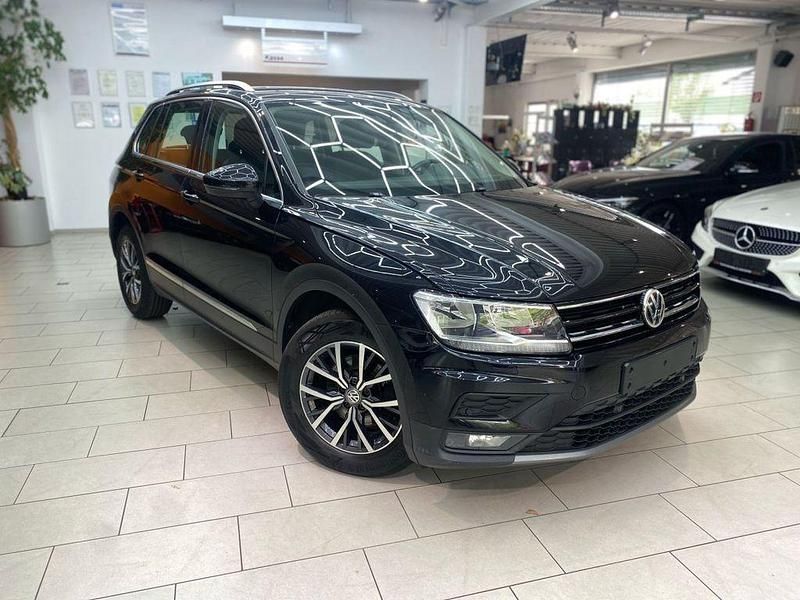 Deep black perleffekt Gebraucht 2018 VW Tiguan Comfortline SUV | 18.950 € (Fairer Preis) - Bild 1/4