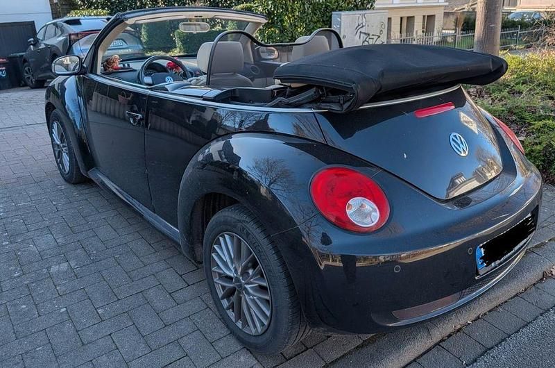 Gebraucht VW New Beetle 102 PS (75 kW) 2010 Schwarz Kleinwagen