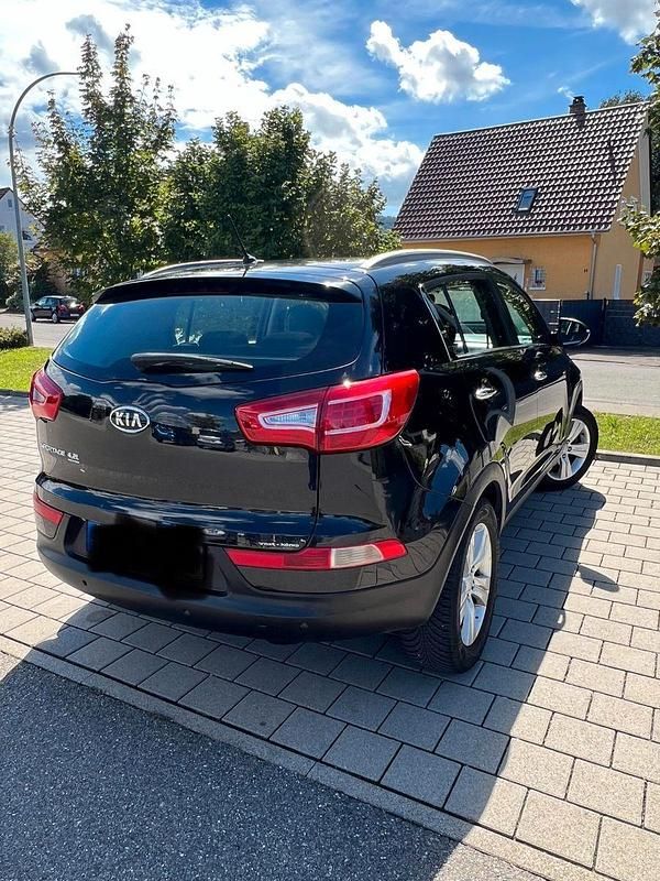 Schwarz Gebraucht 2011 Kia Sportage Attract SUV | 7.300 € - Bild 1/4