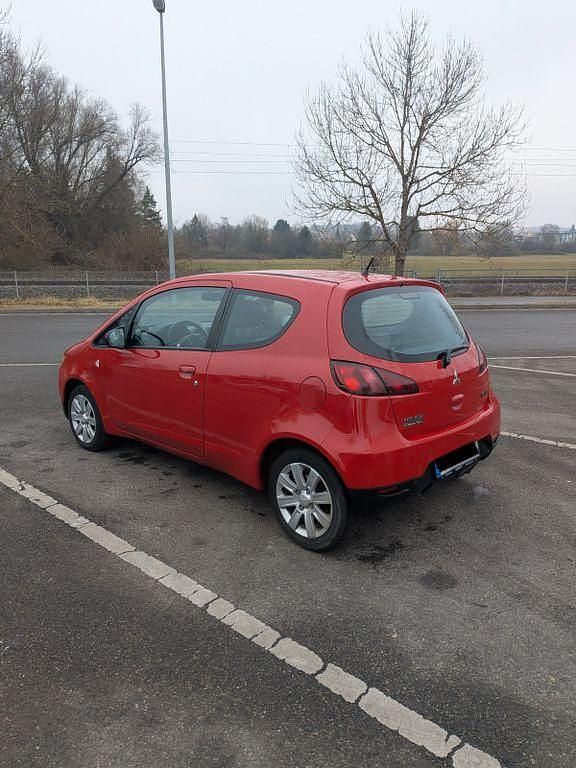Gebraucht Mitsubishi Colt Top 95 PS (69 kW) 2011 Rot Kleinwagen