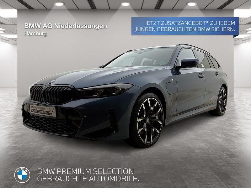 Blau Gebraucht 2024 BMW 330e M Sport Kombi | 53.911 € - Bild 1/4