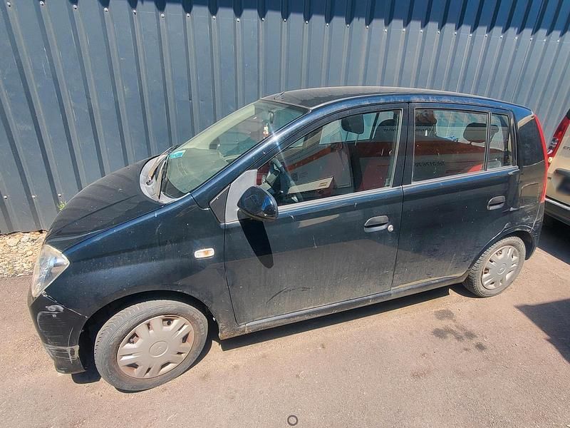Gebraucht Daihatsu Sirion 2012 Schwarz Kleinwagen
