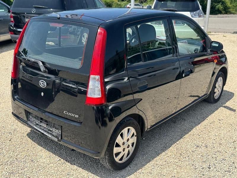 Gebraucht Daihatsu Cuore 69 PS (50 kW) 2005 Schwarz Kleinwagen