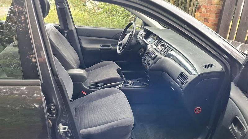 Gebraucht Mitsubishi Lancer Comfort Edition 135 PS (99 kW) 2005 Schwarz Kombi