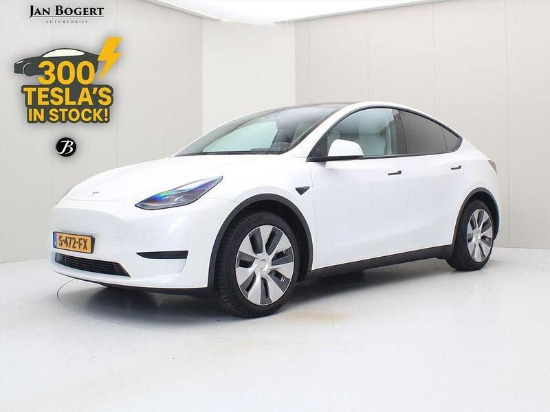Weiß Gebraucht 2022 Tesla Model Y Standard Range SUV | 30.900 € - Bild 1/4