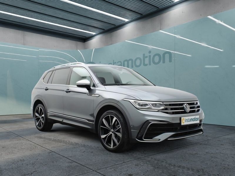 Grau Gebraucht 2024 VW Tiguan Allspace R-line SUV | 44.398 € (Fairer Preis) - Bild 1/4