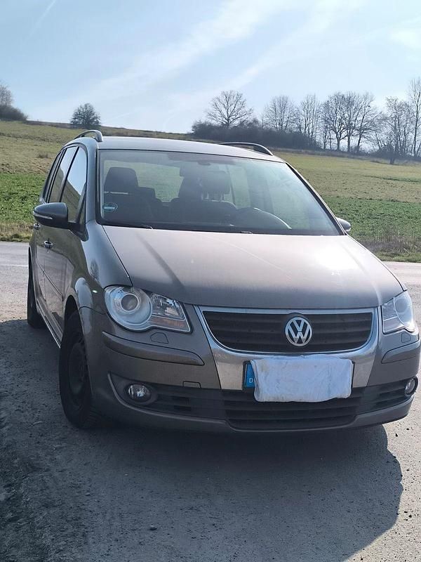 Gebraucht VW Touran 105 PS (77 kW) 2010 Grau Van / Kleinbus