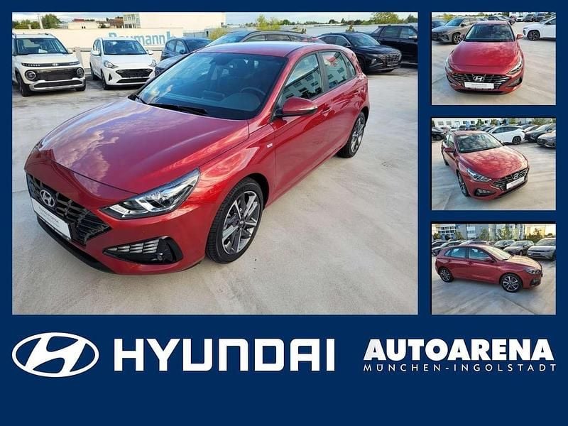 Sunset red / mic Gebraucht 2023 Hyundai i30 Trend Limousine | 18.975 € (Fairer Preis) - Bild 1/4
