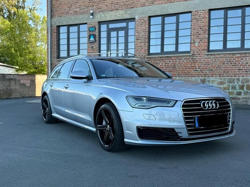 Second-hand Audi A6 218 CP (160 kW) 2015 Argintiu Break