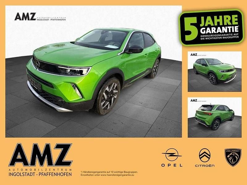 Matcha green/ikone gruen (metallic) Gebraucht 2022 Opel Mokka-e Elegance SUV | 15.490 € (Guter Preis) - Bild 1/4