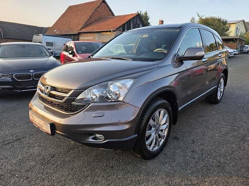 Grau Gebraucht 2012 Honda CR-V Elegance SUV | 14.890 € (Fairer Preis) - Bild 1/4