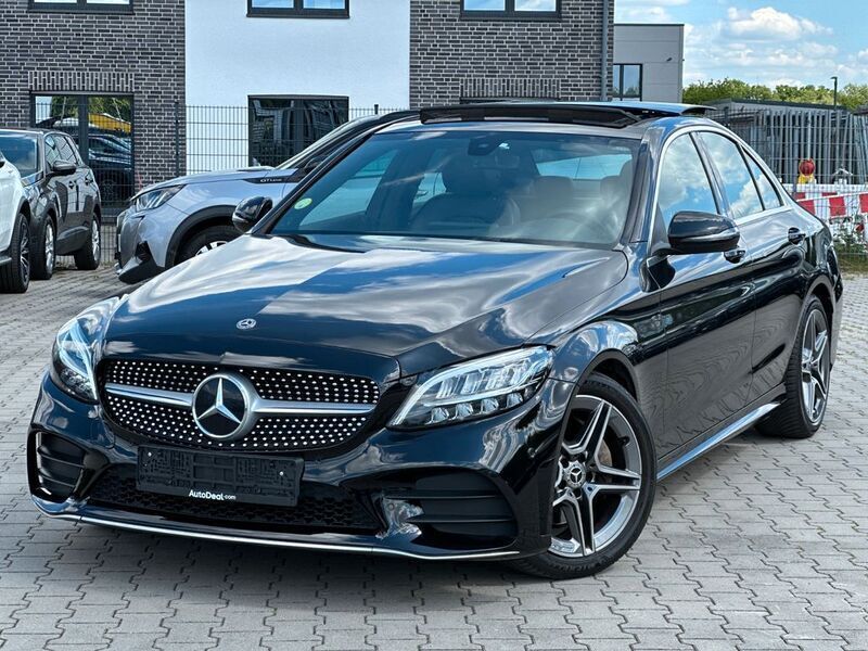 Schwarz Gebraucht 2019 Mercedes C180 AMG line Limousine | 22.729 € (Teuer) - Bild 1/4