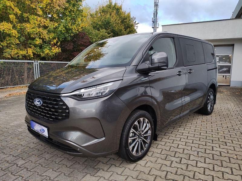 Gebraucht Ford Tourneo Titanium X 232 PS (170 kW) 2025 Magnetic grau metallic Van / Kleinbus