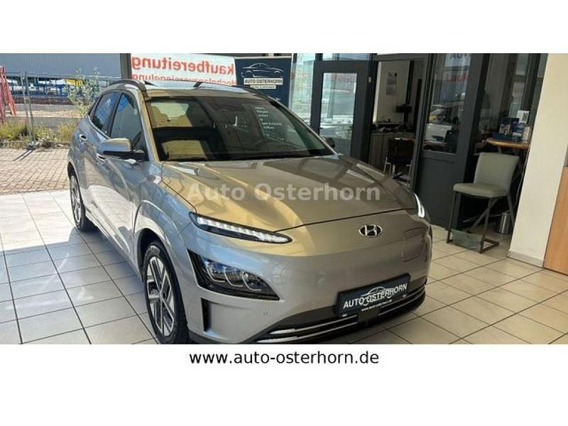 Shimmering silver metallic (metallic) Gebraucht 2021 Hyundai Kona Trend SUV | 18.470 € (Fairer Preis) - Bild 1/4