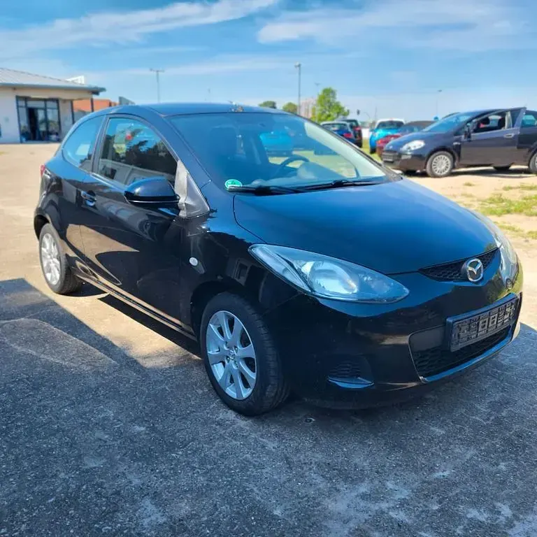 Gebraucht Mazda 2 Inclusive 75 PS (55 kW) 2010 Schwarz Kleinwagen
