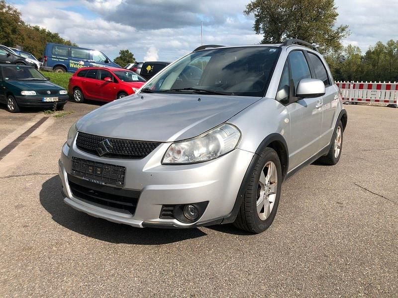 Grau Gebraucht 2009 Suzuki SX4 Kleinwagen | 2.450 € (Etwas zu teuer) - Bild 1/4