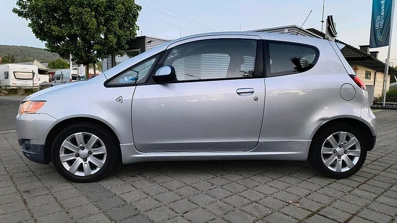 Second-hand Mitsubishi Colt 95 CP (69 kW) 2012 Argintiu Hatchback