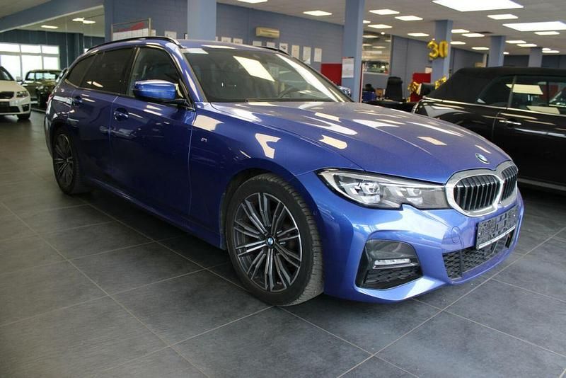 M portimao blau metallic Gebraucht 2022 BMW 320 M Sport Kombi | 31.980 € (Guter Preis) - Bild 1/4