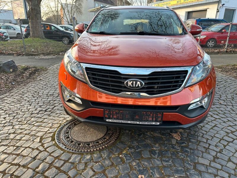 Orange Gebraucht 2013 Kia Sportage FIFA World Cup Edition SUV | 9.499 € (Guter Preis) - Bild 1/4