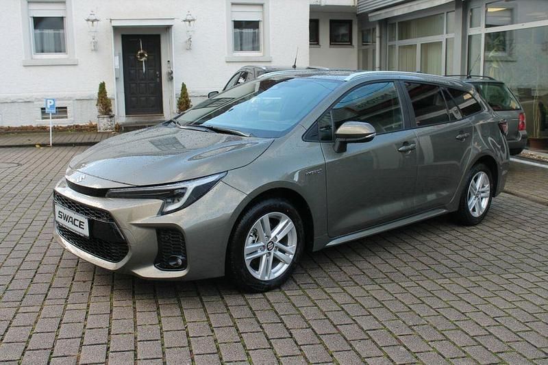 Braun Neu 2025 Suzuki Swace Comfort+ Kombi | 28.900 € - Bild 1/4