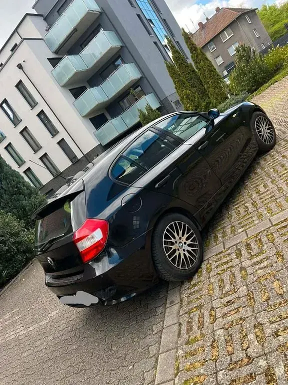 Second-hand BMW 116 116 CP (85 kW) 2006 Negru Hatchback