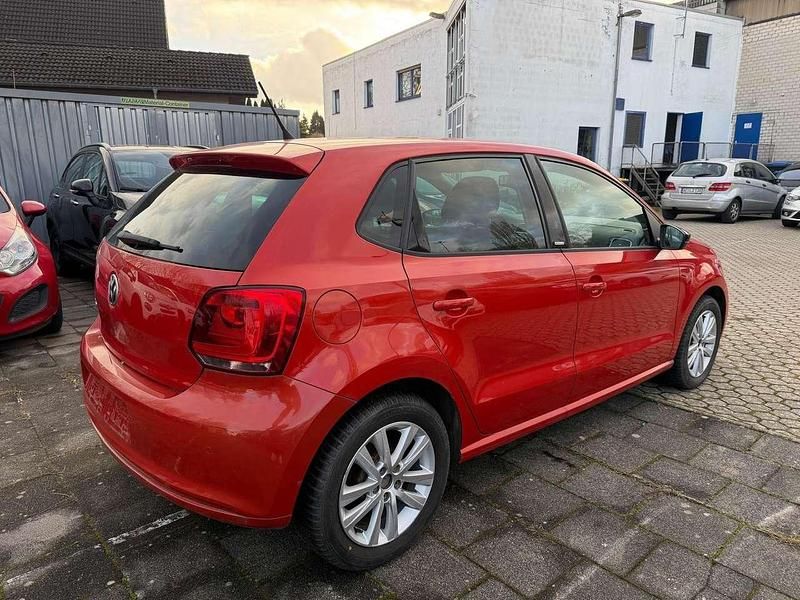 Gebraucht VW Polo Style 69 PS (50 kW) 2011 Hot orange metallic Kleinwagen