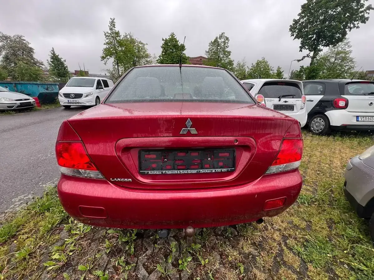 Second-hand Mitsubishi Lancer Comfort Edition 98 CP (72 kW) 2004 Roșu Berlinǎ