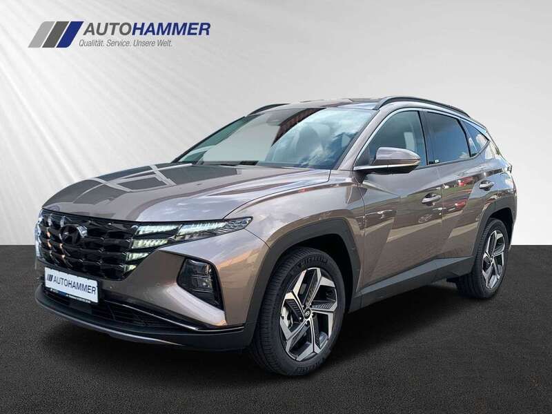 Silky bronze / min Gebraucht 2023 Hyundai Tucson Trend SUV | 31.980 € (Guter Preis) - Bild 1/4