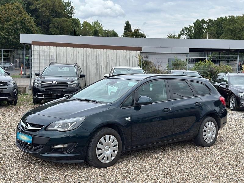 Grün Gebraucht 2014 Opel Astra Energy Kombi | 3.999 € (Superpreis) - Bild 1/4