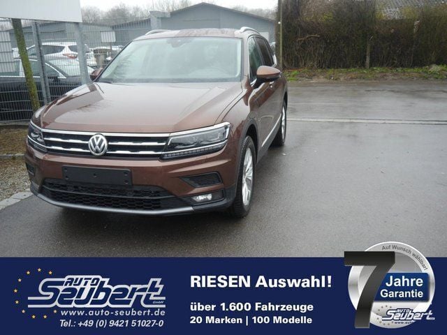 Braun metallic Gebraucht 2018 VW Tiguan Allspace Active SUV | 30.790 € (Fairer Preis) - Bild 1/4