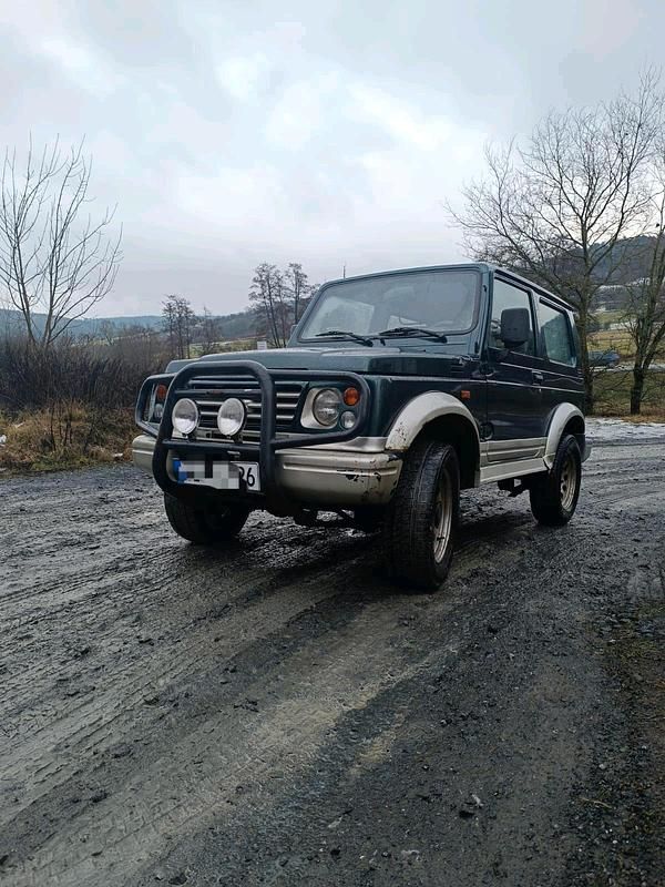 Grün Gebraucht 2004 Suzuki Samurai SUV | 4.950 € - Bild 1/4