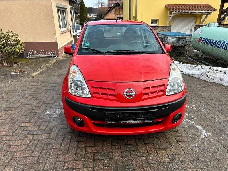 Gebraucht Nissan Pixo Visia 68 PS (50 kW) 2009 Rot Kleinwagen