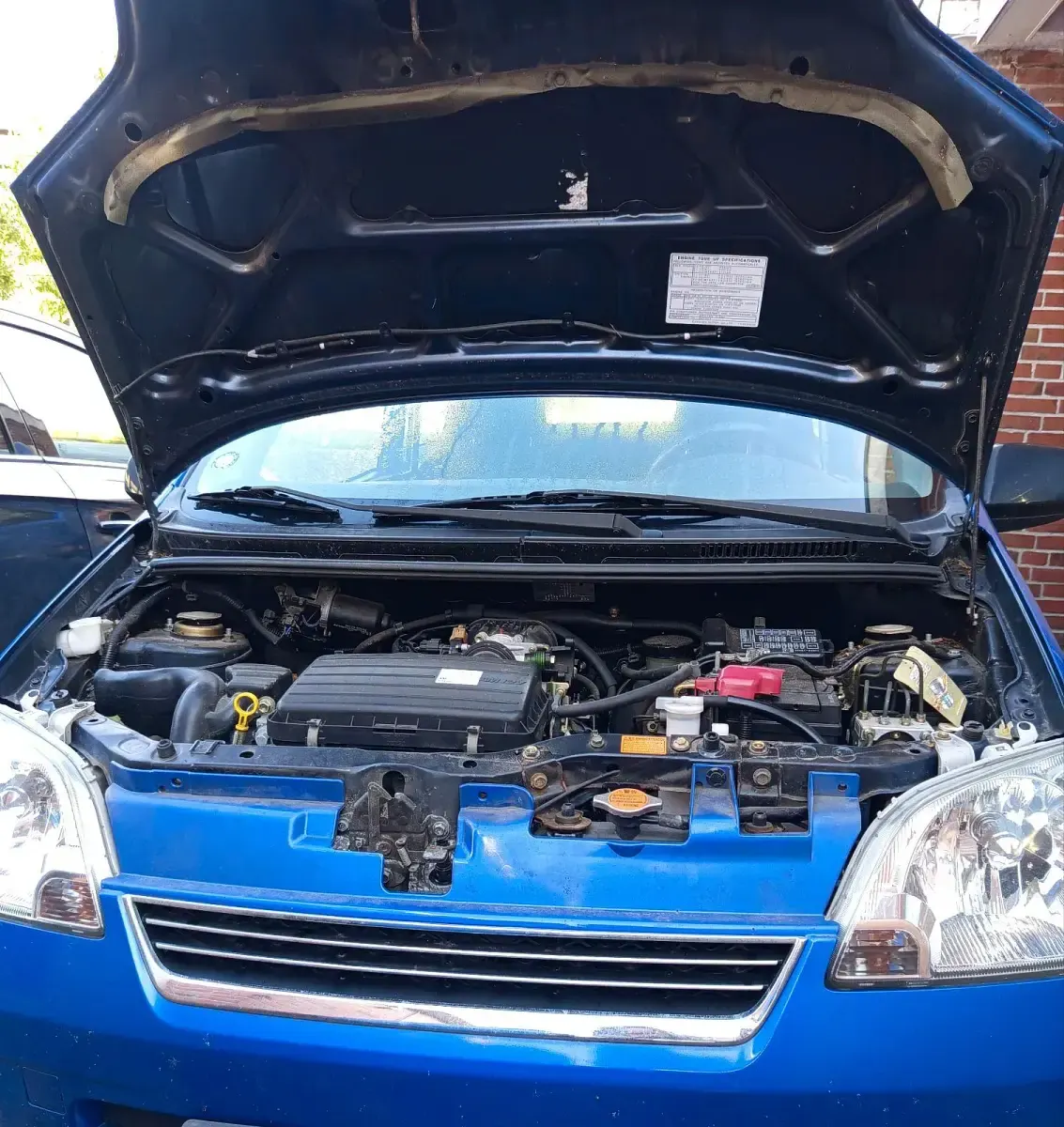 Gebraucht Daihatsu Cuore 54 PS (39 kW) 2004 Blau Kleinwagen