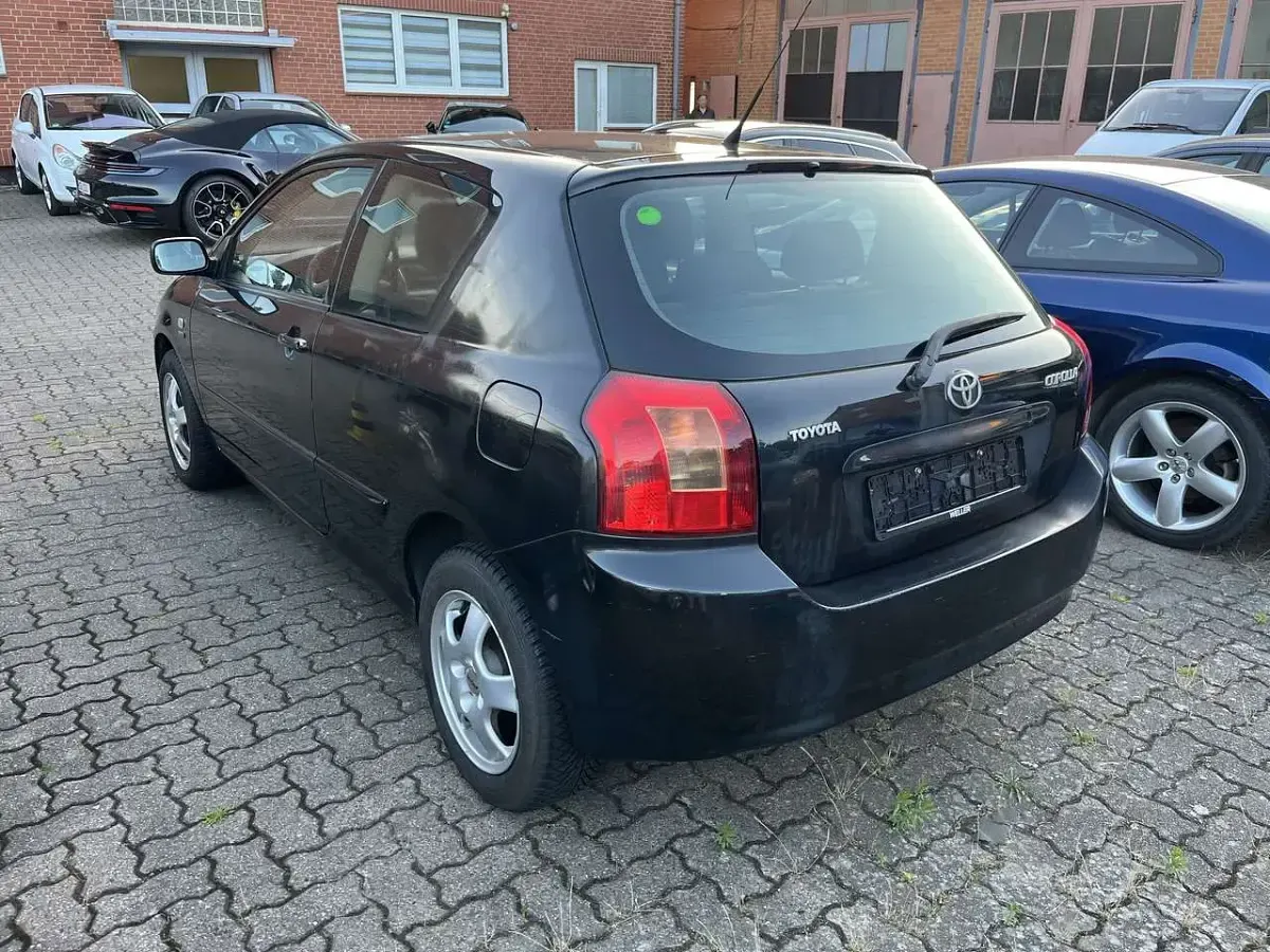 Gebraucht Toyota Corolla Sol 97 PS (71 kW) 2003 Black mica / ink Limousine