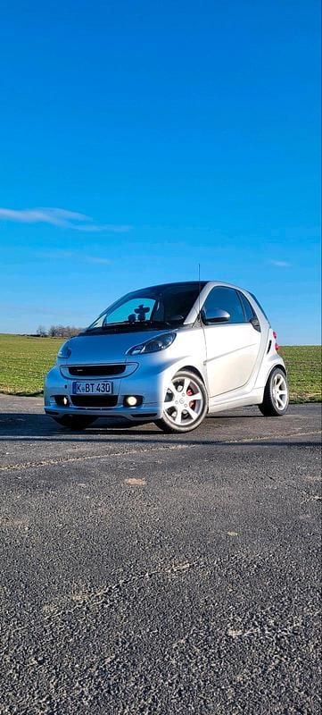 Silber Gebraucht 2010 Smart ForTwo Coupé Brabus Coupé | 7.900 € - Bild 1/4