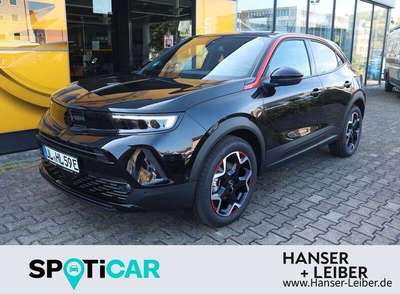 Karbon schwarz Gebraucht 2023 Opel Mokka-e SUV | 24.960 € (Teuer) - Bild 1/4