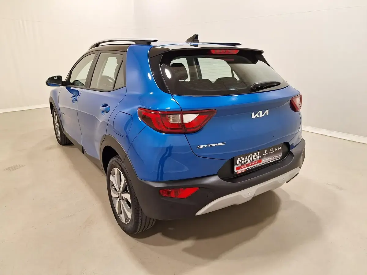 Gebraucht Kia Stonic Vision 101 PS (74 kW) 2023 Bathysblau met./schwarz SUV